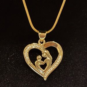 Beautiful Mother and Daughter heart charm gold plated necklace.